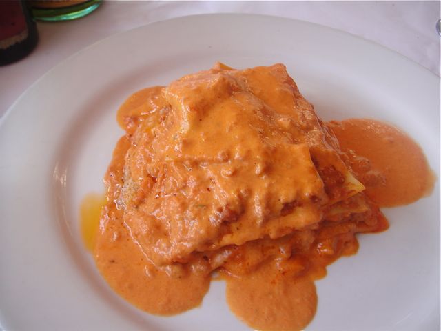 Il Pastaio signature dishes Pumpkin RavioliSquid Ink RisottoSpicy Tomato Sauce (Arrabbiata)